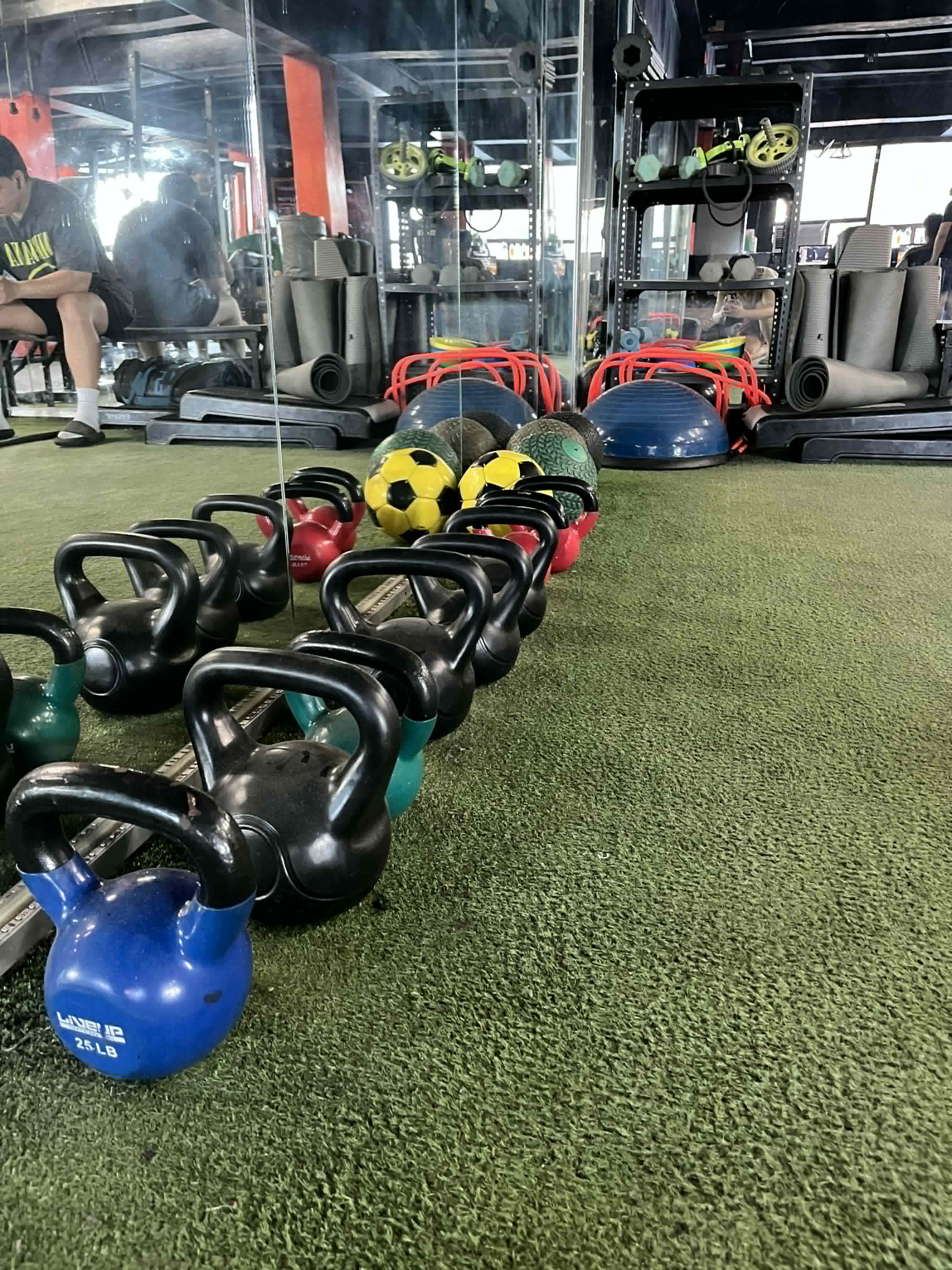 Kettlebells on turf